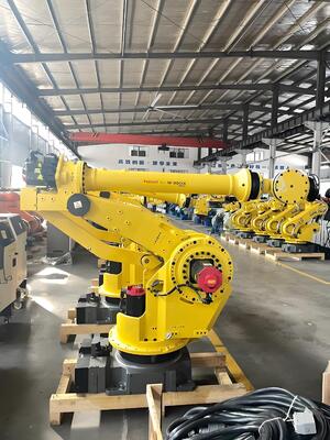 FANUC 레이저 절단 셀, 자동 로딩/해하 및 턴 테이블, 자동차 산업에서 3D 금속 공작품을 대량 생산