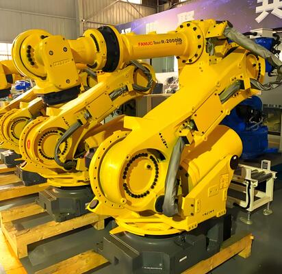 FANUC 레이저 절단 셀, 자동 로딩/해하 및 턴 테이블, 자동차 산업에서 3D 금속 공작품을 대량 생산